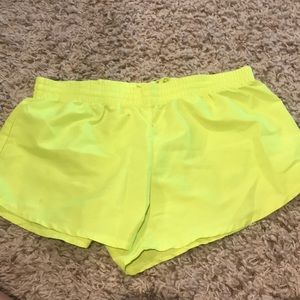 Neon yellow athletic shorts